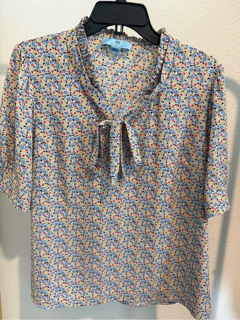 CeCe Cream Floral Tie-Neck Blouse with Red and Blue Accents